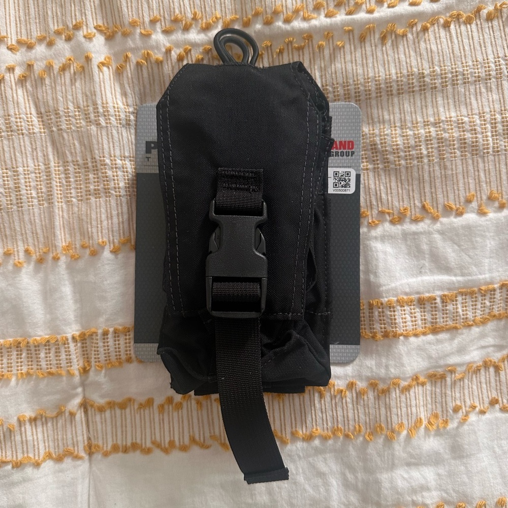 Black Safariland Tactical radio pouch.